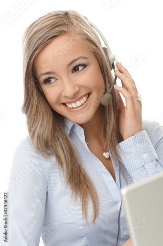 Photo: Portrait of young customer service representative Portrait of young customer service representative