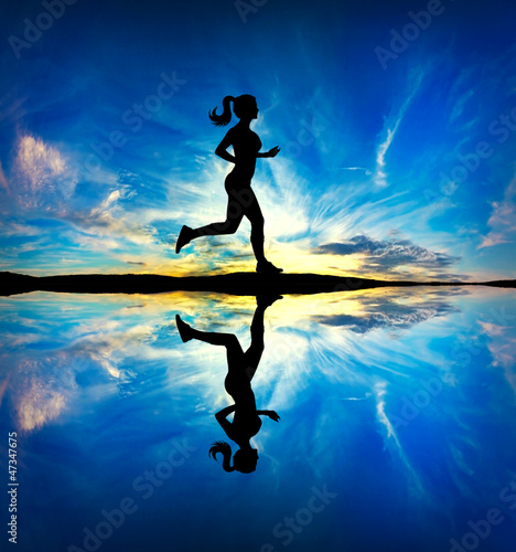 Photo: Woman running in the morning Woman running in the morning