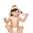Baby girl with a red Christmas hat