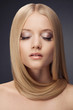 Fashion Blond Girl. Beautiful Makeup and Healthy Hair