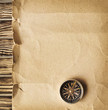 Compass on the old paper background