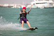 Kiteboarder enjoy surfing