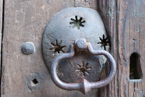 Photo: an old metal door handle knocker an old metal door handle knocker