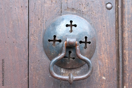 Photo: an old metal door handle knocker an old metal door handle knocker