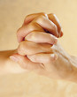 Foto: Conceptual image of young and mature people hands together Conceptual image of young and mature people hands together