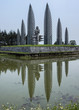 Vietnam - DMZ: War memorial of sad woman with child in reflectin