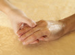 Foto: Conceptual image of young and mature people hands together Conceptual image of young and mature people hands together