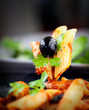 Pasta with tomato and olives