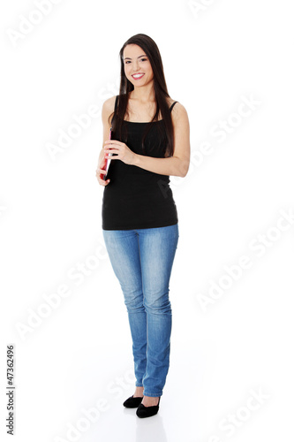 Photo: Happy student woman with notebooks Happy student woman with notebooks