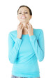 Young beautiful woman scraching her self.