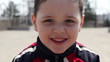 little boy laughs and smiles 2