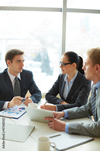 Photo: Discussing strategies Discussing strategies