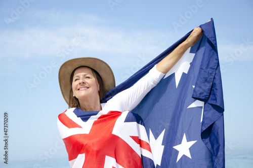 Photo: Woman and Australian Flag isolated Woman and Australian Flag isolated