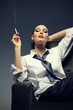 Photo: Sensual woman smoking a cigarette Sensual woman smoking a cigarette