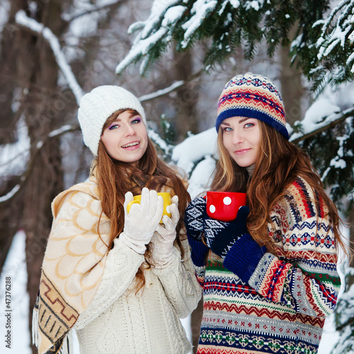 Photo: Attractive young woman in wintertime outdoor Attractive young woman in wintertime outdoor