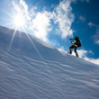 Hiker in winter mountains