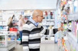 Mature Man Shopping In A Supermarket