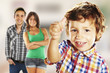 Child doing ok, with his parents looking happy