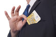 Man putting money in his pocket