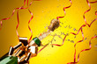 Champagne splashes from just opened bottle