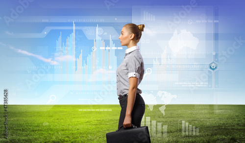 Photo: Businesswoman agaisnt virtual background Businesswoman agaisnt virtual background