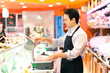 Butcher at work in a supermarket