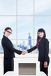 Business women partnership with laptop in office
