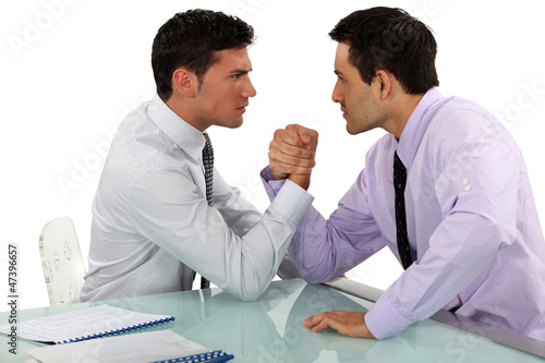 Photo: Businessmen arm wrestling Businessmen arm wrestling