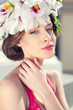 portrait of fashion woman with flowers on head, spring