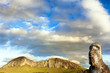 Head of moai with mountain in background in Easter Island