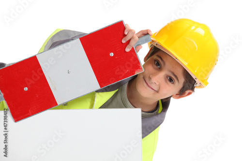 Photo: Child with yellow helmet Child with yellow helmet
