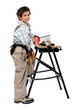 Full length shot of a young boy pretending to be a carpenter
