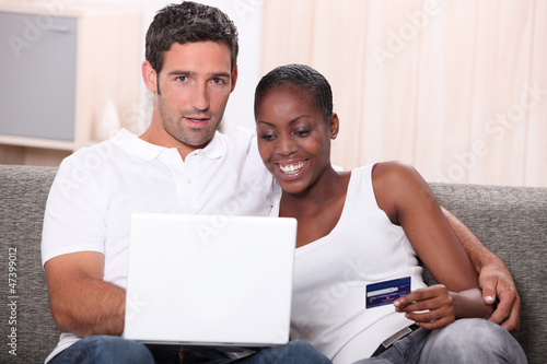 Photo: Couple buying on-line Couple buying on-line