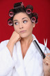 Woman wearing hair rollers