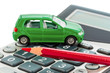 Auto, Rotstift und Taschenrechner