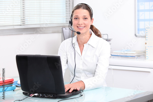 Photo: Young brunette secretary Young brunette secretary