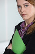 Young businesswoman with file.
