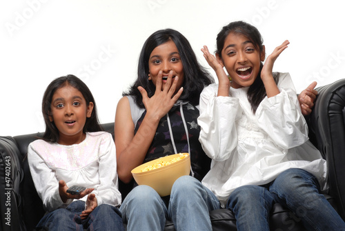 Photo: Group of girls watching TV Group of girls watching TV