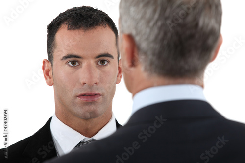 Photo: Boss having chat with employee Boss having chat with employee