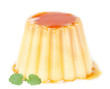 Delicious pudding with caramel and mint leaves. On a white backg