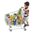 Photo: Cute boy walking with shopping trolley isolated on white Cute boy walking with shopping trolley isolated on white