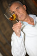 wine expert making tests in a cellar