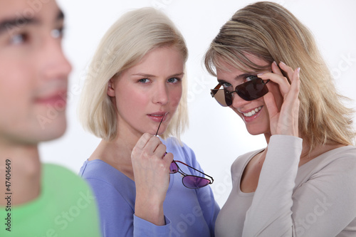 Photo: Women staring at the object of their desire Women staring at the object of their desire
