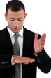 man flipping a coin