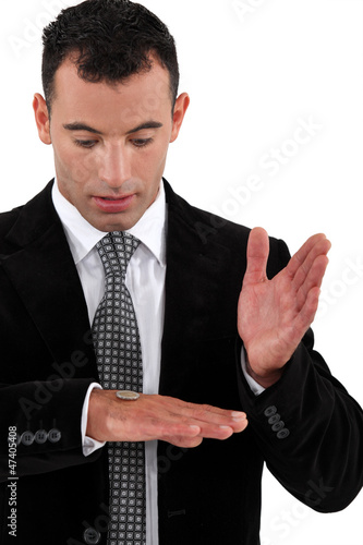 Photo: man flipping a coin man flipping a coin