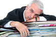 Man lying on paperwork