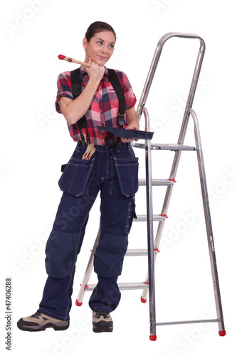 Photo: female painter looking inspired female painter looking inspired