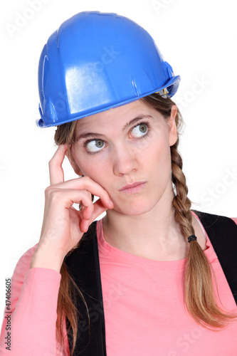 Photo: Pensive tradeswoman Pensive tradeswoman
