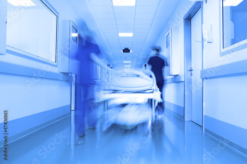 Photo: Bed in a modern clinic corridor Bed in a modern clinic corridor