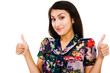 Middle Eastern woman showing thumbs up sign